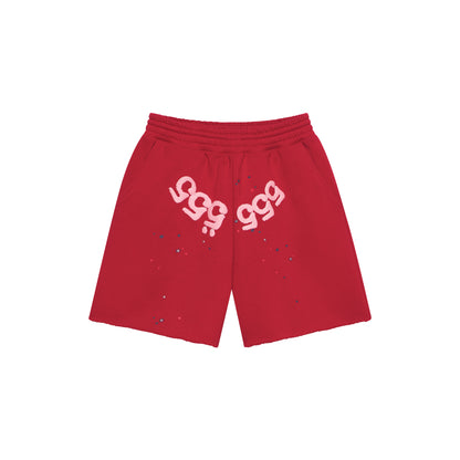 Red 13oz cotton fleece shorts with pink angel number print on crotch, scattered stars, drawcord, and raw hem.