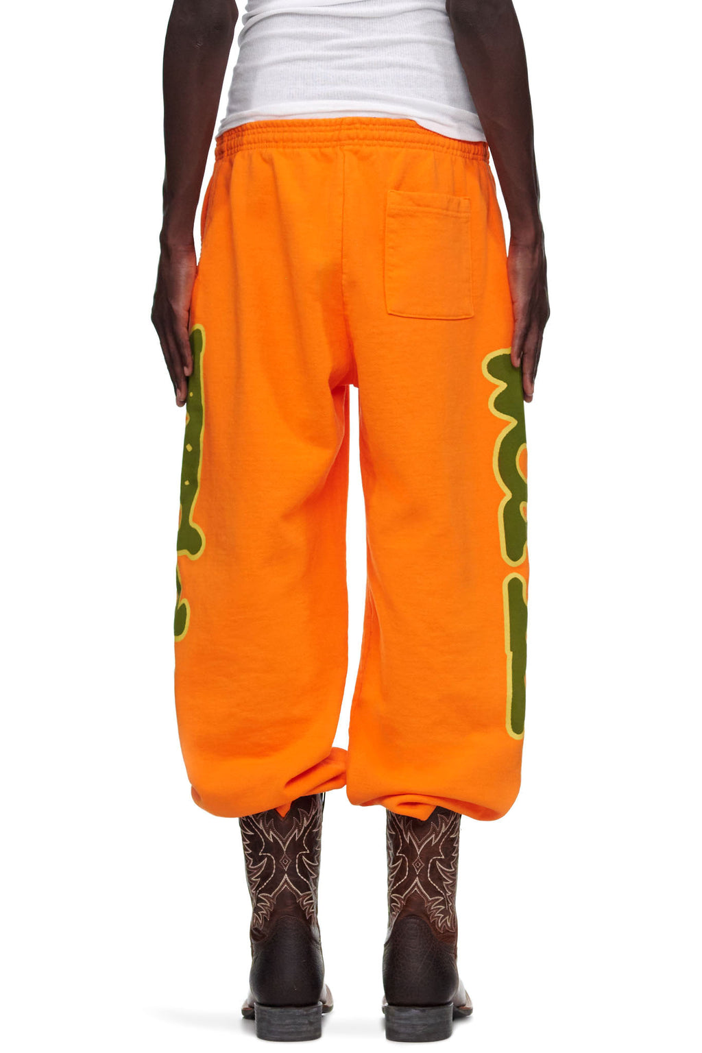 Orange 23oz fleece BELUGA SWEATPANT with green 'Worldwide' puff print down both legs.