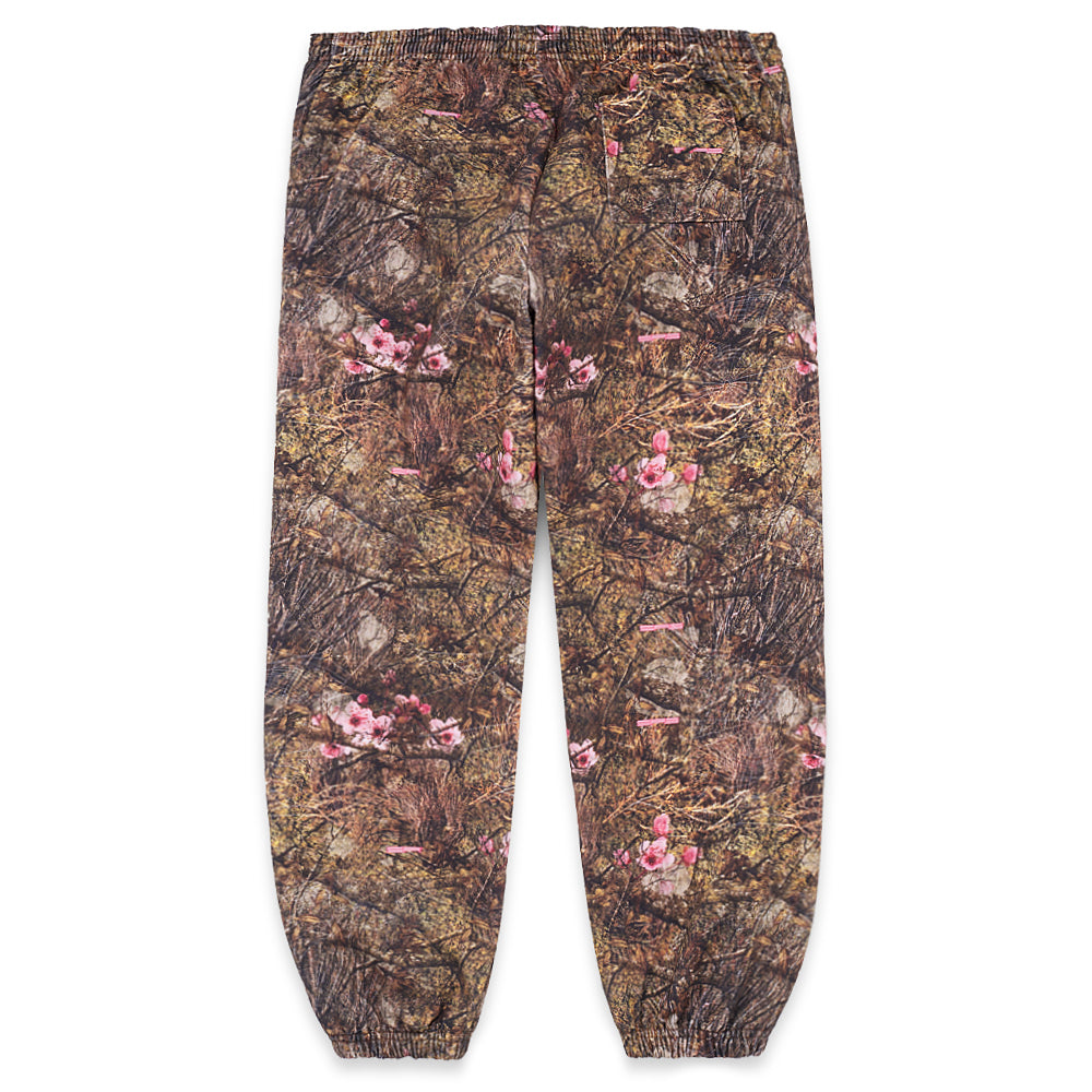 REAL TREE OG WEB SWEATPANT, brown camo fleece with pink floral and OG SP5DER text print.