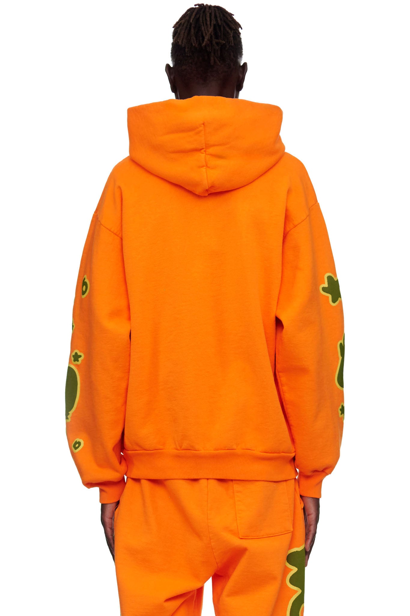 BELUGA HOODIE: Orange 23oz fleece hoodie with green puff print designs on sleeves, worn by male model.