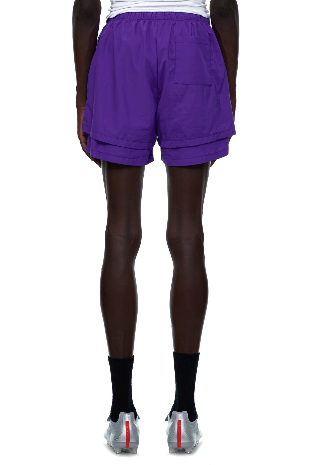 Purple nylon GRAPE LOGO SHORT with high-low double layer design and patch back pocket.