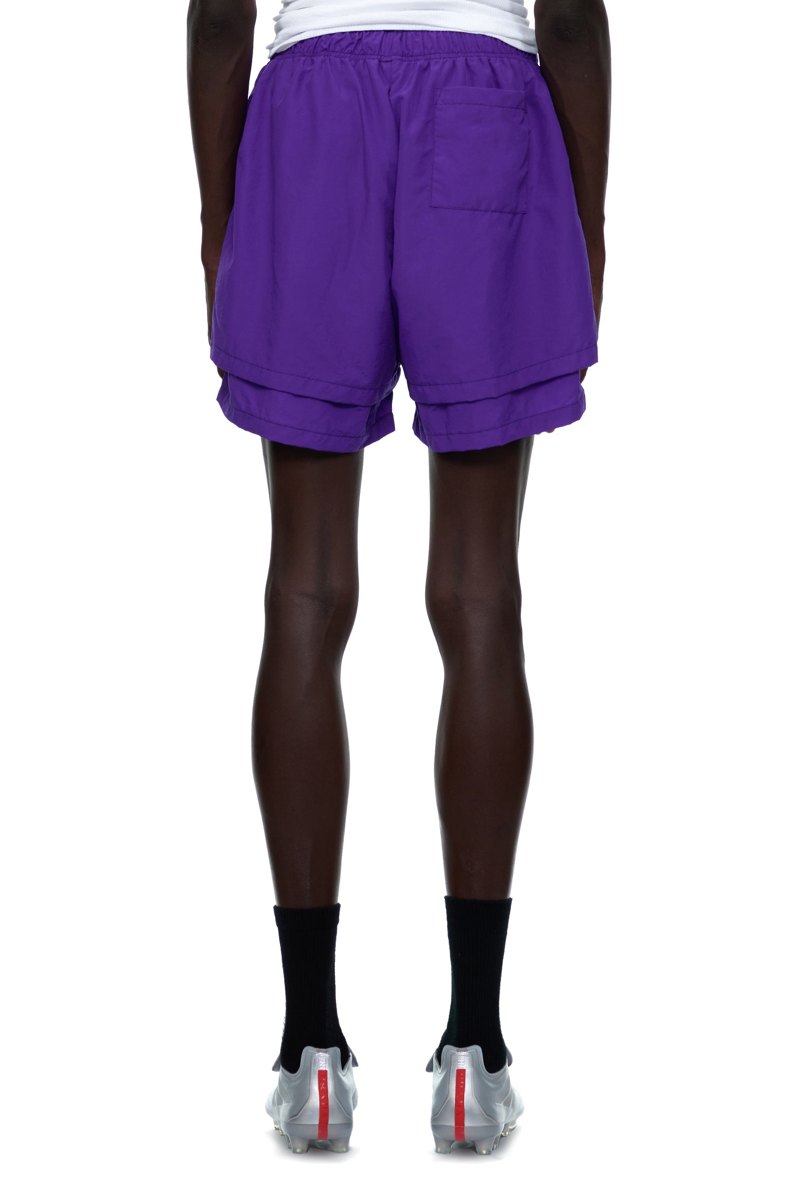 GRAPE SP5 PRO SHORT: Purple 4oz water repellent nylon shorts with high-low double layer design and patch back pocket.
