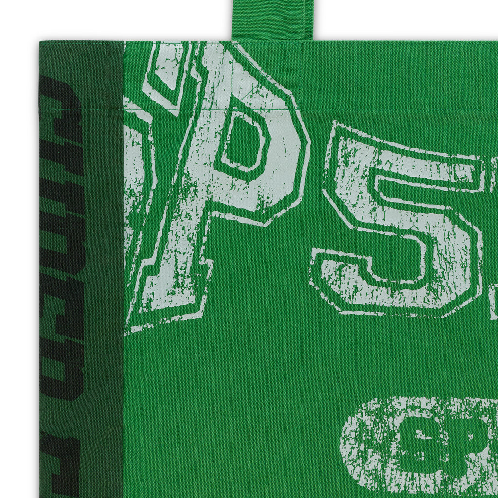 Green 8oz twill SUPERFIVE TOTE with white SP5DER graphic and dark green side stripe.