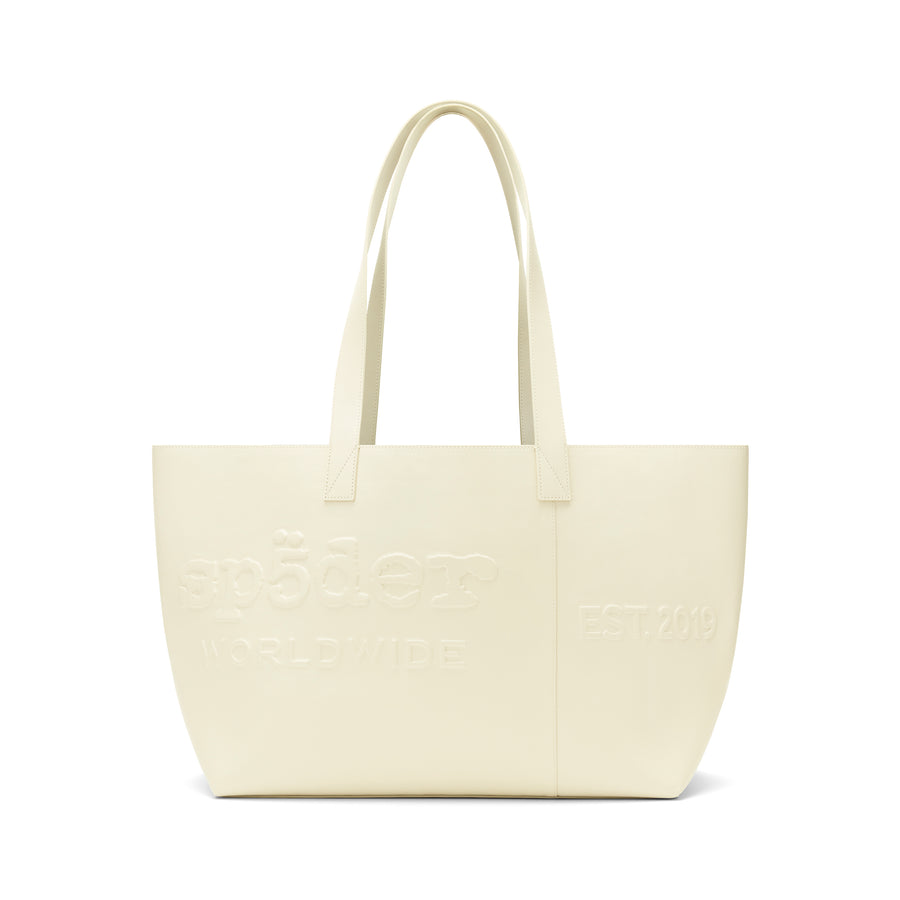 Ghost leather tote bag with embossed logo, "EST. 2019" detail, and dual shoulder straps.