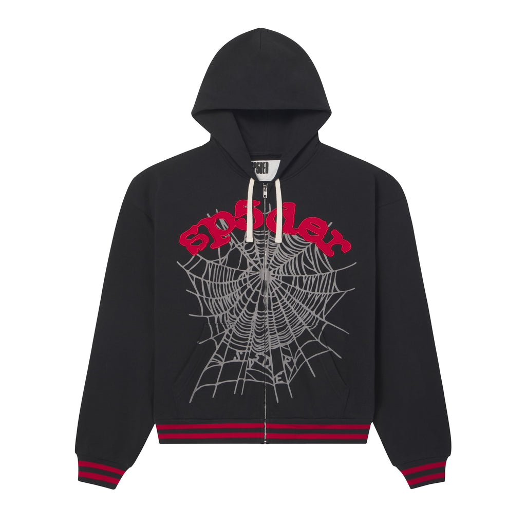 Black cotton fleece zip hoodie with red appliqué text, grey web graphic print, contrast drawstrings, and striped ribbed trim.