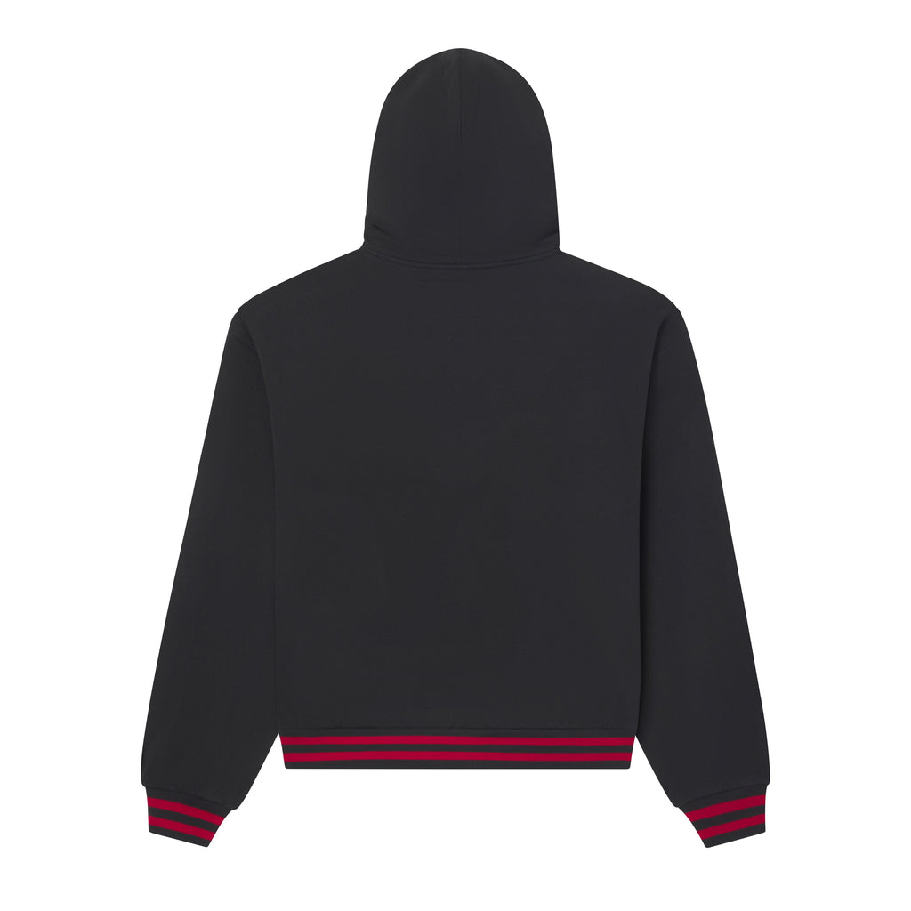 Back view of a black 13oz cotton fleece zip hoodie with red striped ribbed cuffs and hem.