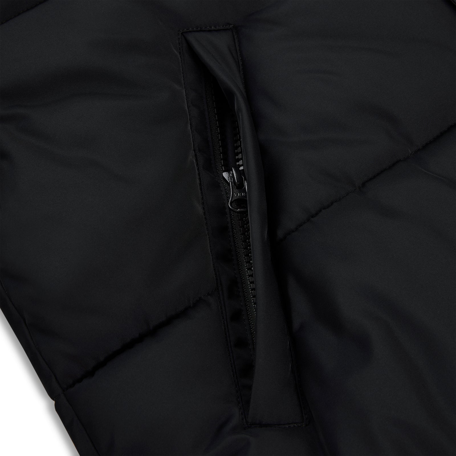 Black poly-fill puffer jacket with a visible side pocket zipper.