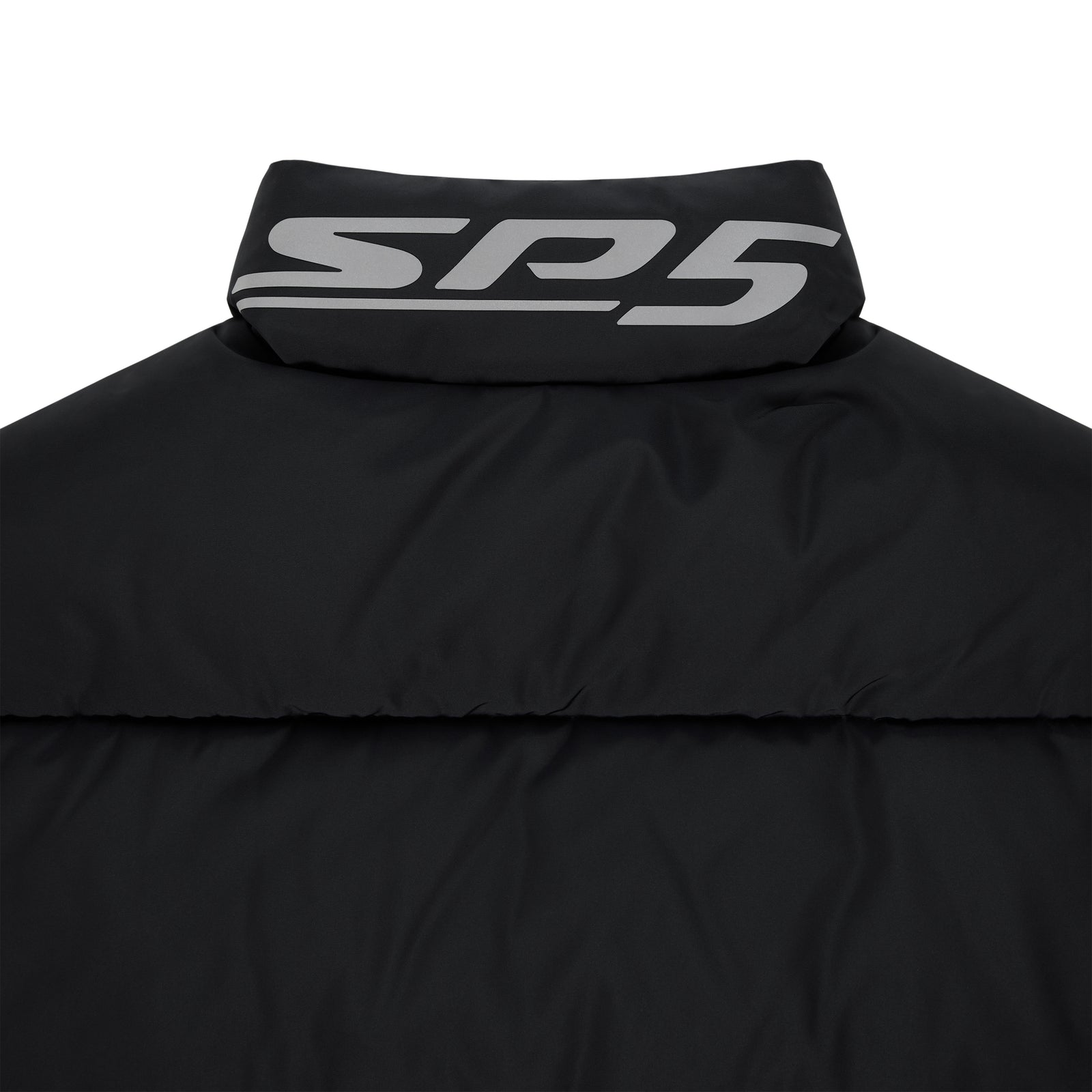 Black TRACKHAWK puffer jacket with reflective "SP5" graphic on the back neck collar.