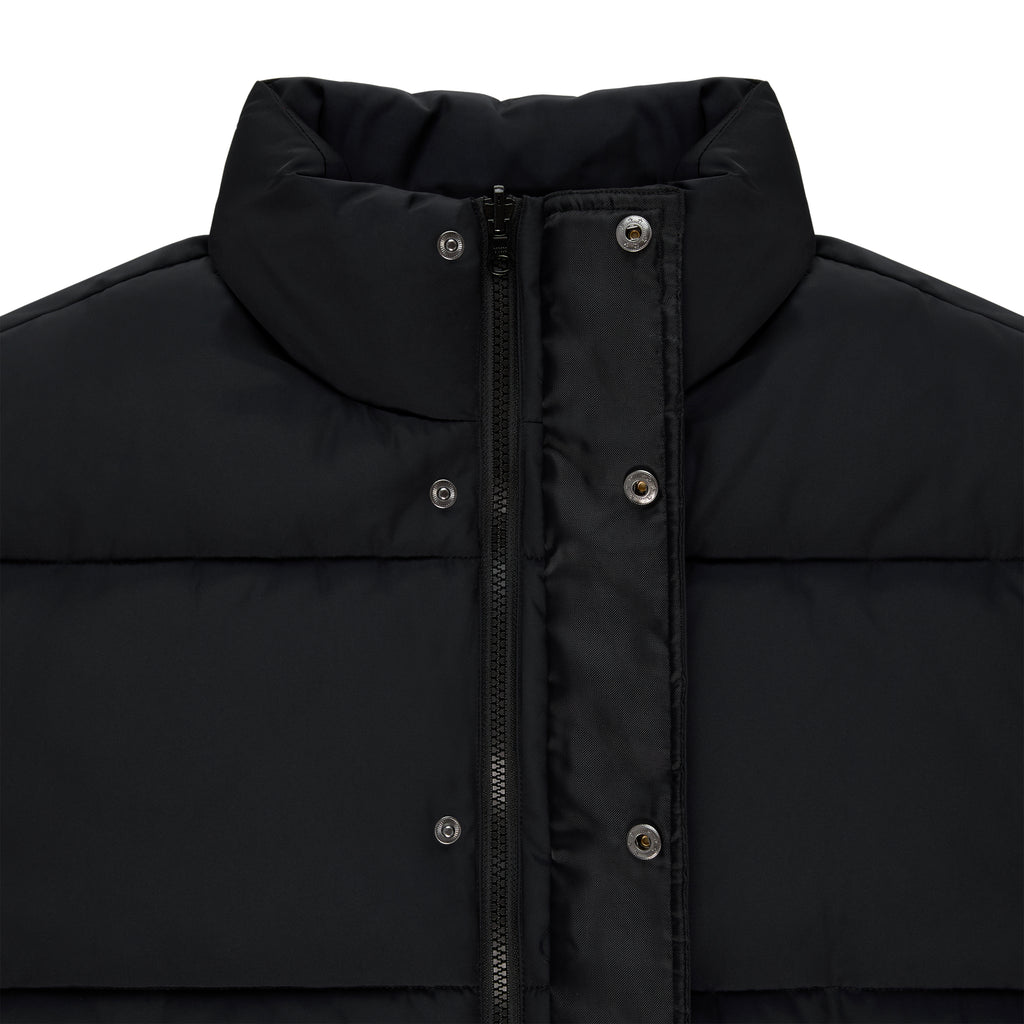 Black TRACKHAWK poly-fill puffer jacket with front zip, snap placket, and high collar.