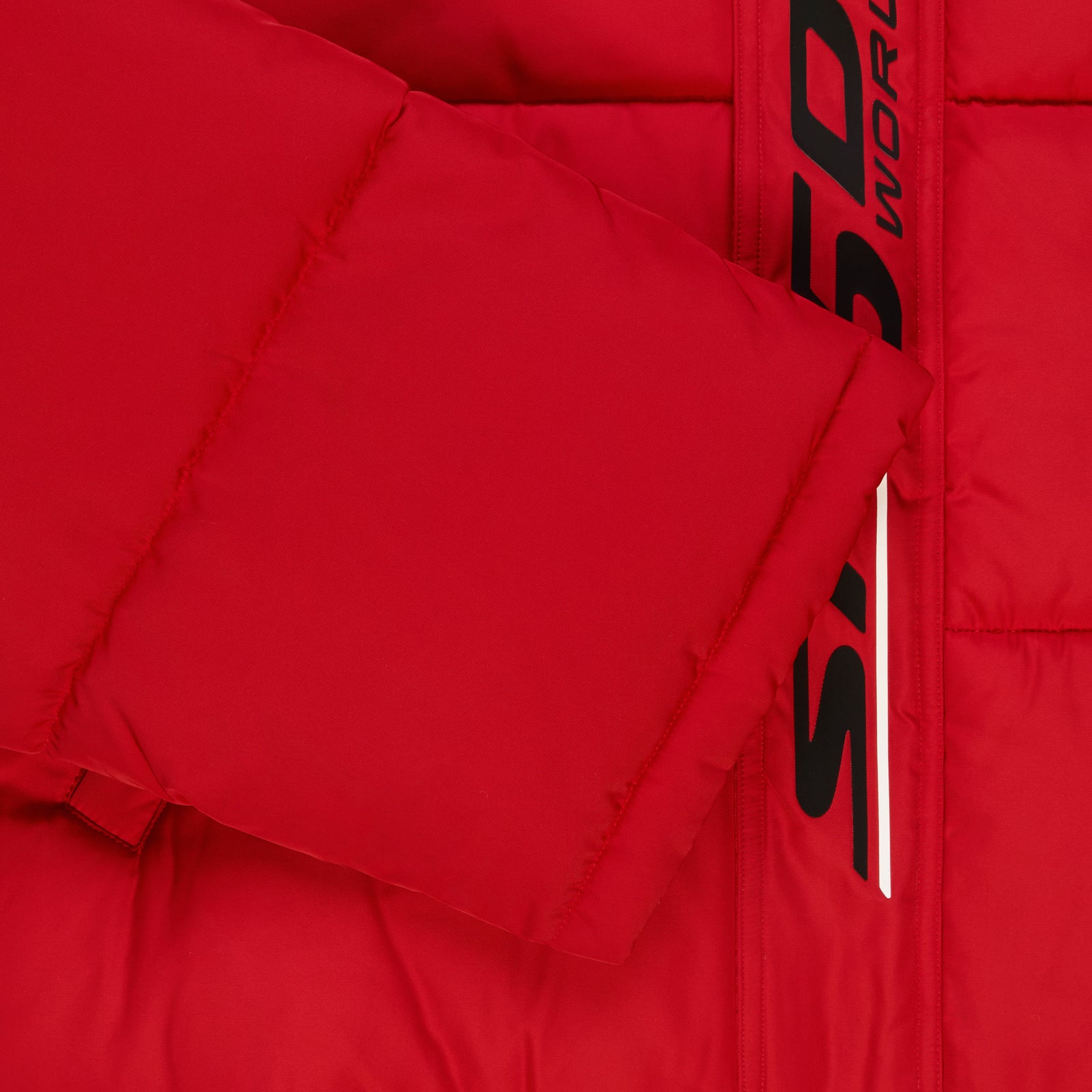 Red poly-fill puffer jacket with black reflective text graphic along the front placket.