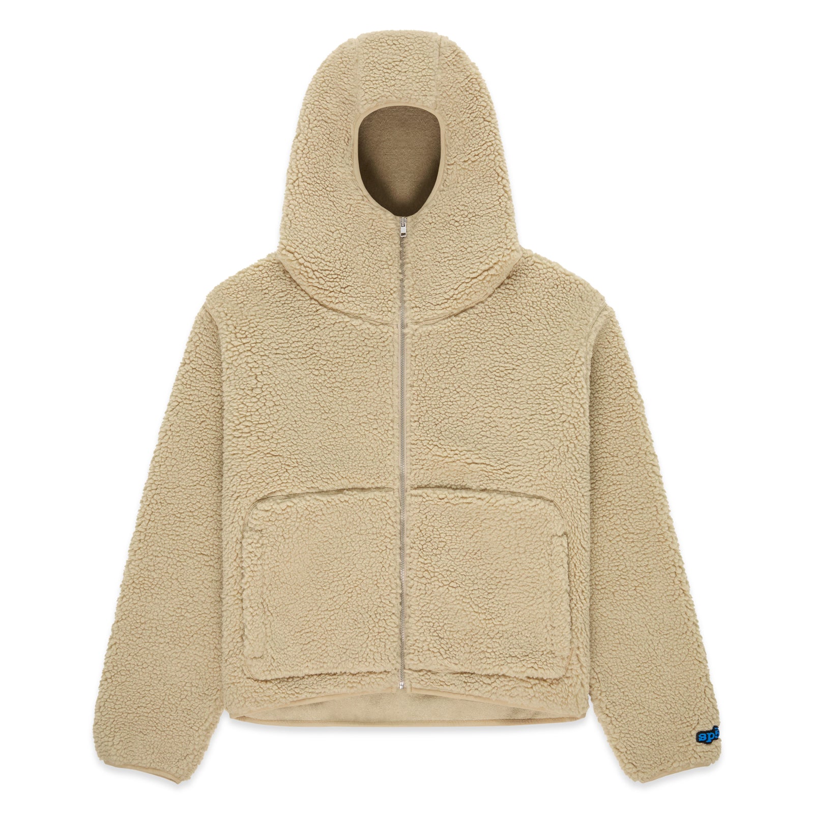 Beige sherpa fleece zip-up hooded jacket with narrow front opening, welt pockets, and rubberized logo patch.