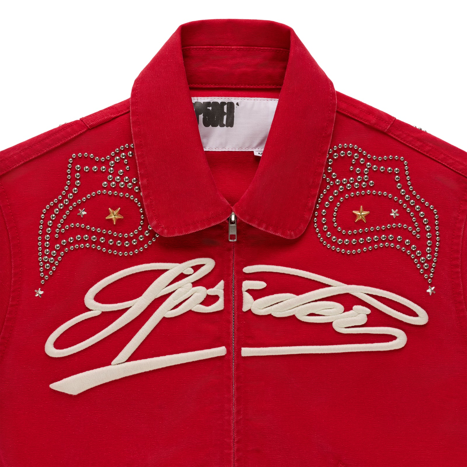 Red cotton canvas bomber jacket with embroidered script, studded shoulders, and a zip closure.