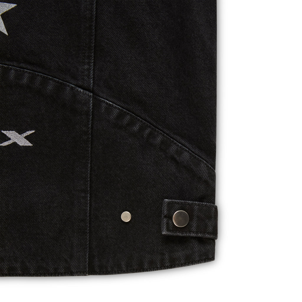Faded black denim jacket with silver star print, SP5DER logo, and press-stud details.