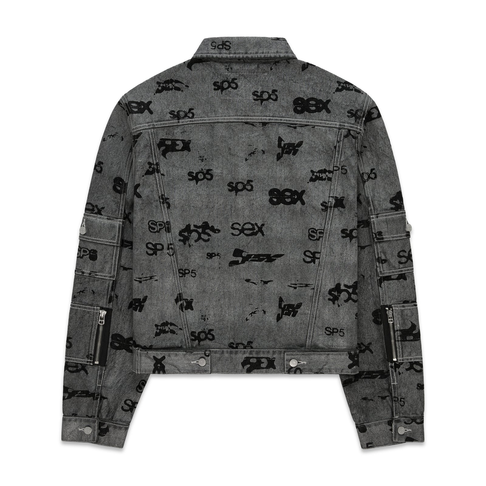 Gray denim trucker jacket with all-over black print, red contrast stitching, and arm pockets.