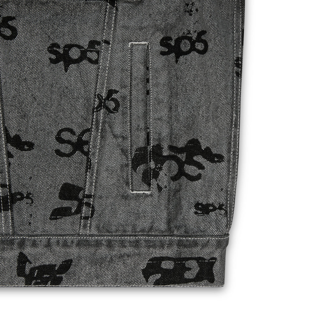 Gray denim trucker jacket with all-over black "SEX" print and red contrast stitching.
