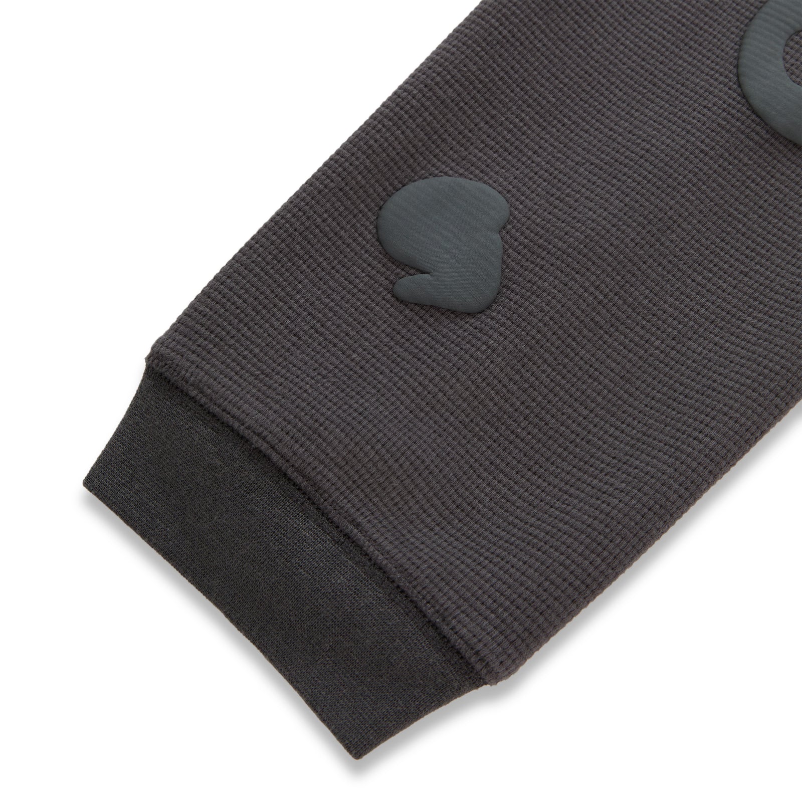 Dark grey waffle knit thermal sleeve with ribbed cuff and raised Beluga print.