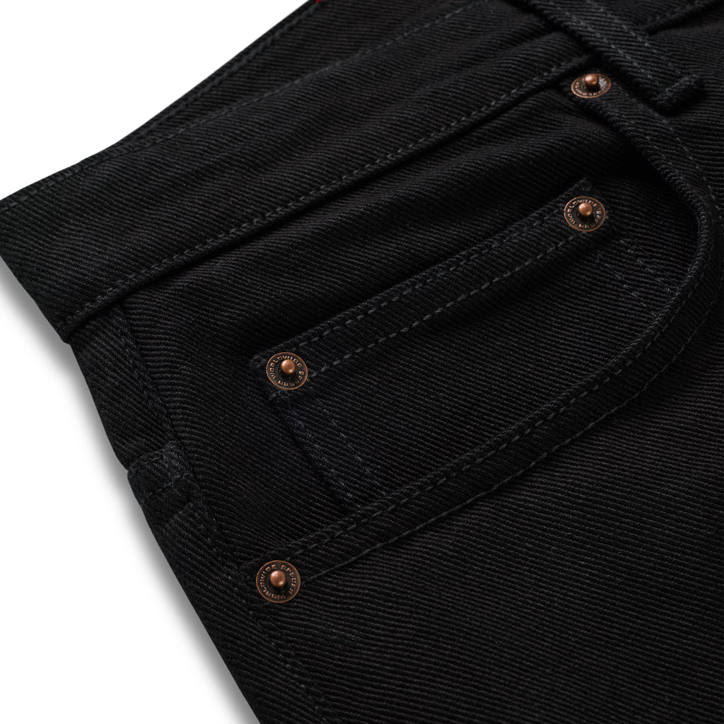 Black 13oz denim jeans with branded copper hardware and shank buttons.