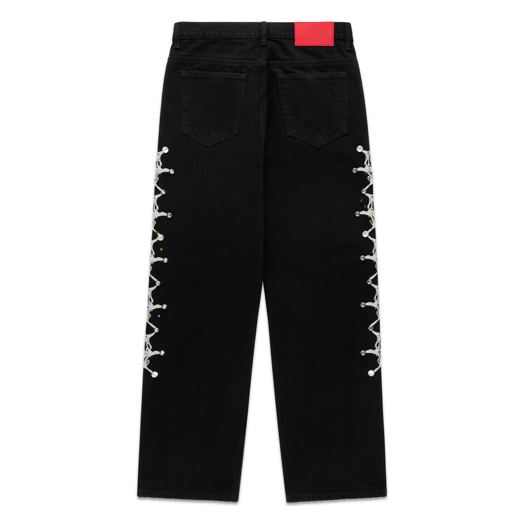 Black 13oz vintage wash denim pants with web print and rhinestone embellishments down both legs.