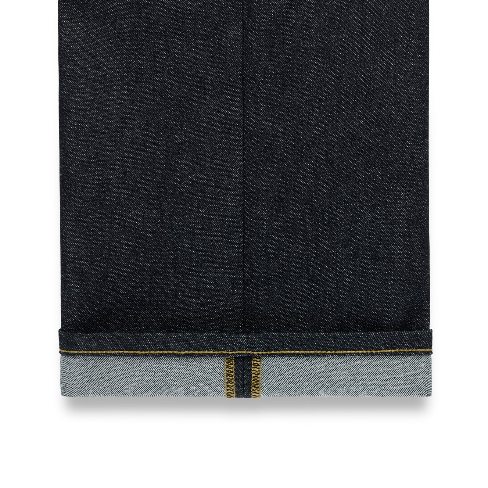 Dark indigo denim jeans with a straight leg fit and a cuffed hem revealing yellow selvedge stitching.