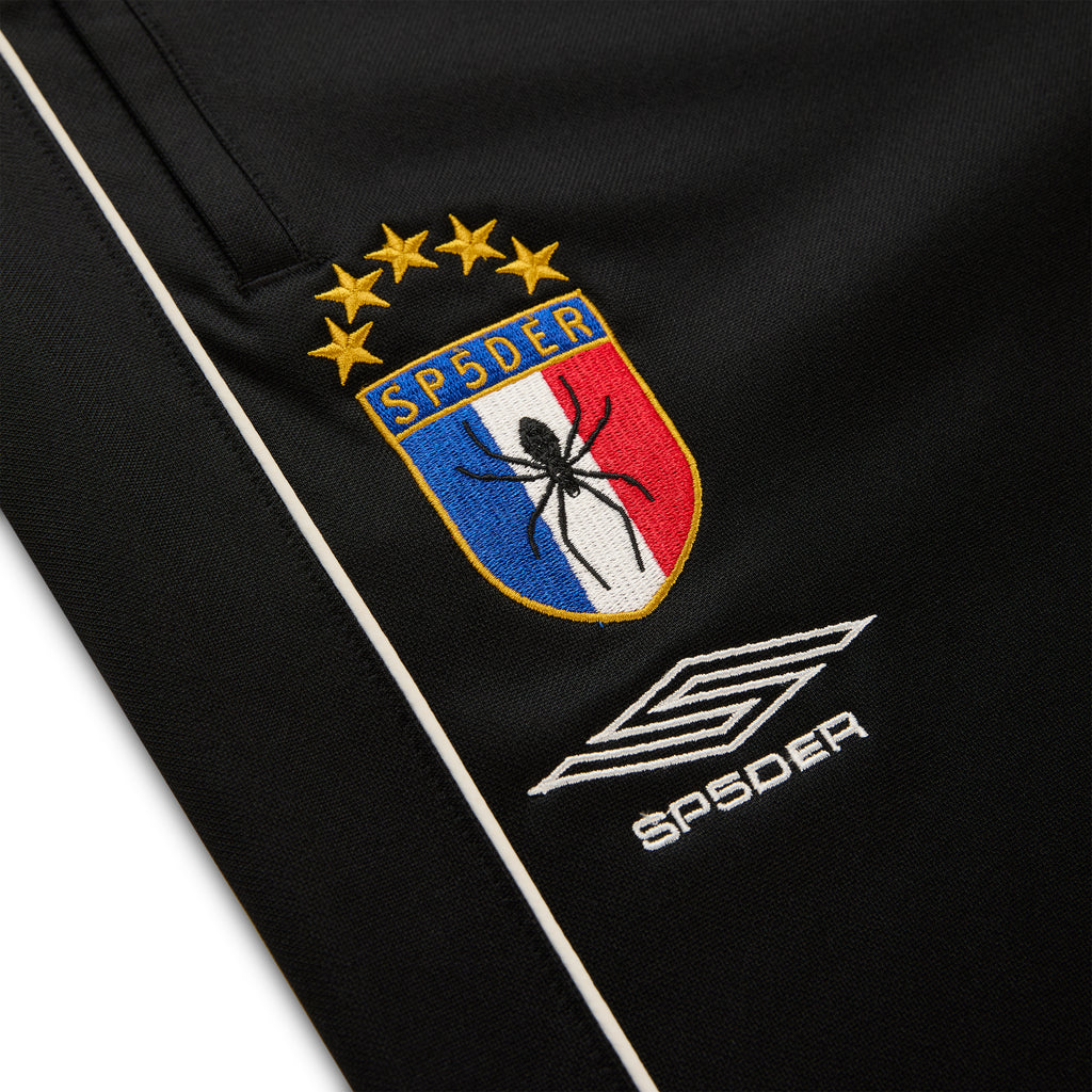 Black ATLANTA TRACK PANT with SP5DER crest logo, white piping, and SP5DER branding.