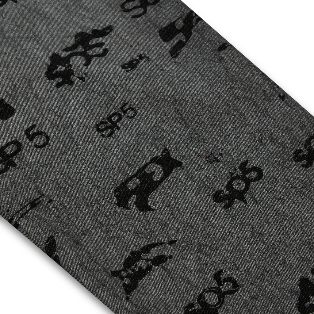 Gray denim pant with all-over black SP5DER print and subtle red contrast stitching.