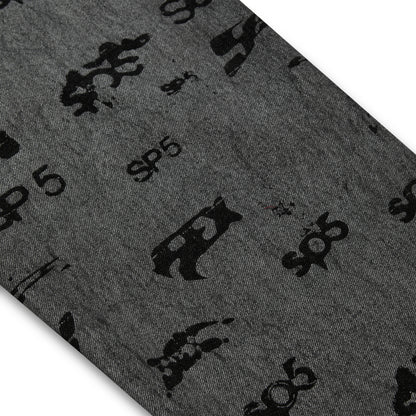 Gray denim pant with all-over black SP5DER print and subtle red contrast stitching.