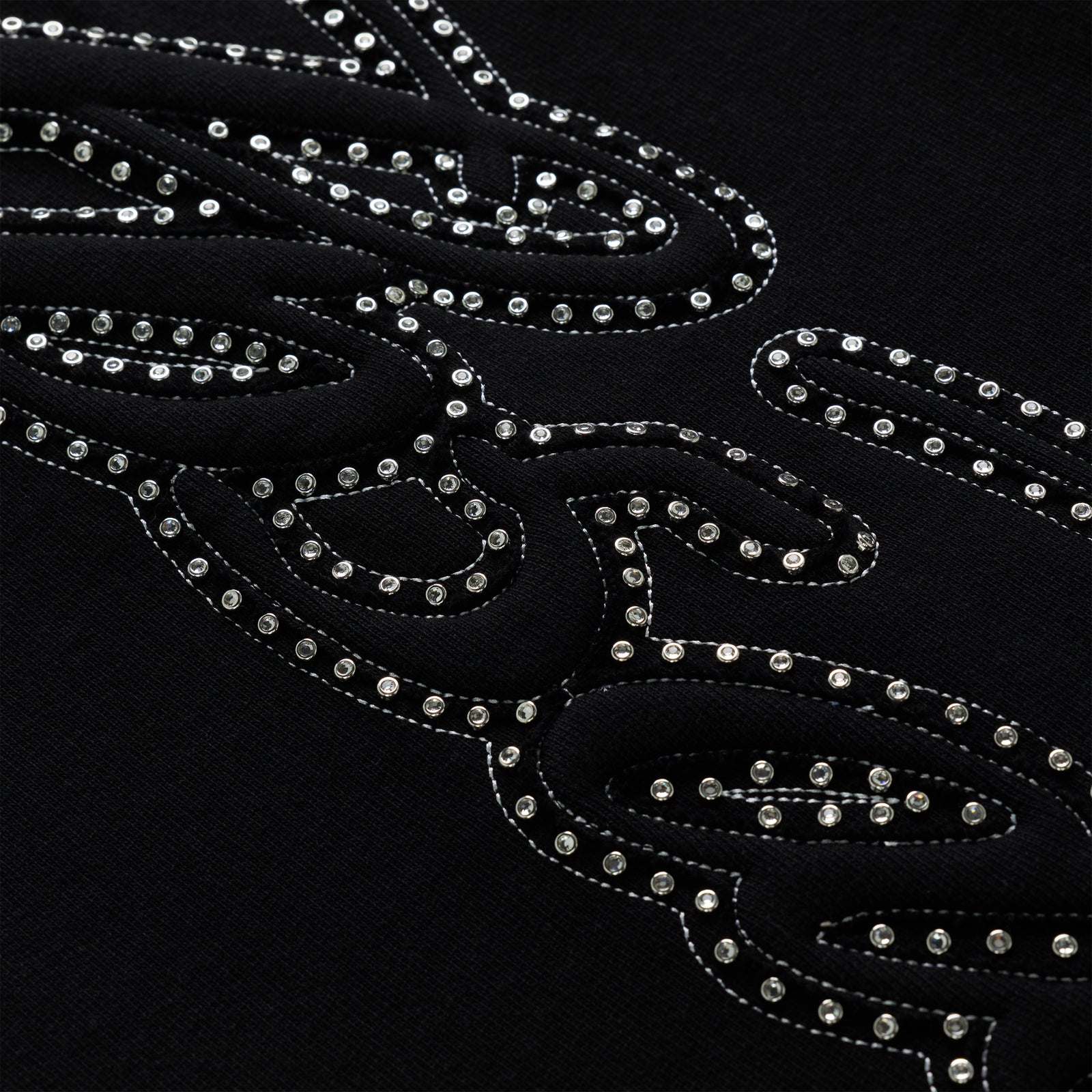 Black 100% cotton fleece sweatpant with rhinestone script text design down the leg.
