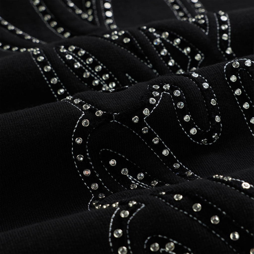 Black cotton fleece wide-leg sweatpant with rhinestone script text design.