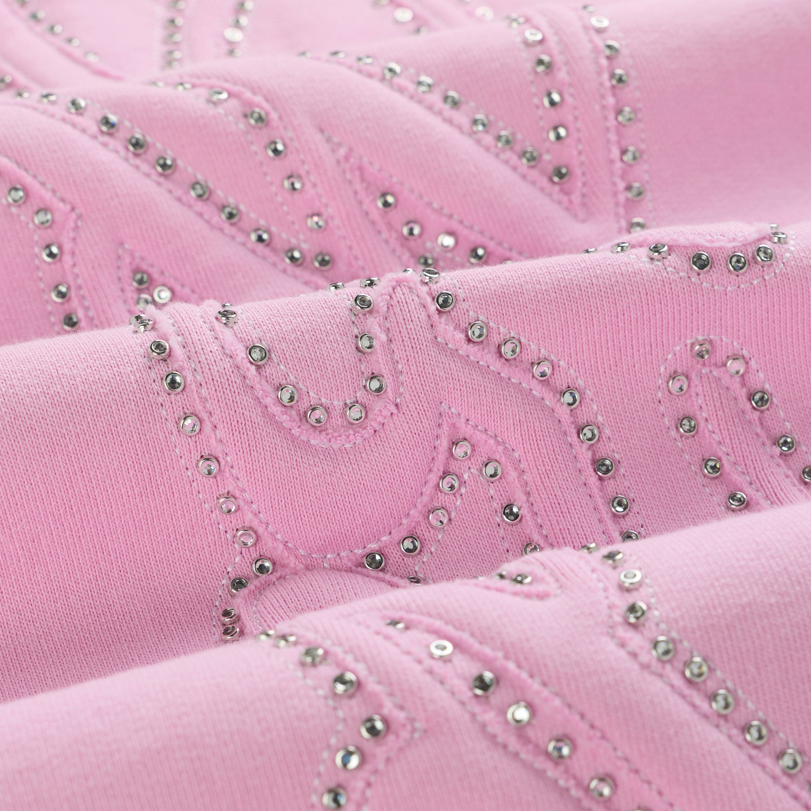 Pink 100% cotton fleece wide-leg sweatpants with rhinestone script design.