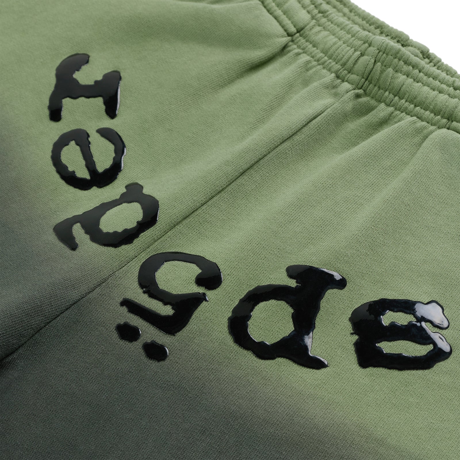 OG WEB OMBRE SWEATPANT: Green 13oz cotton fleece with black puff print 'SP5DER' text and ombre design.