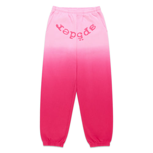 Pink ombre fleece sweatpants with "SP5DER" text at the crotch, elastic waistband, and cuffs.