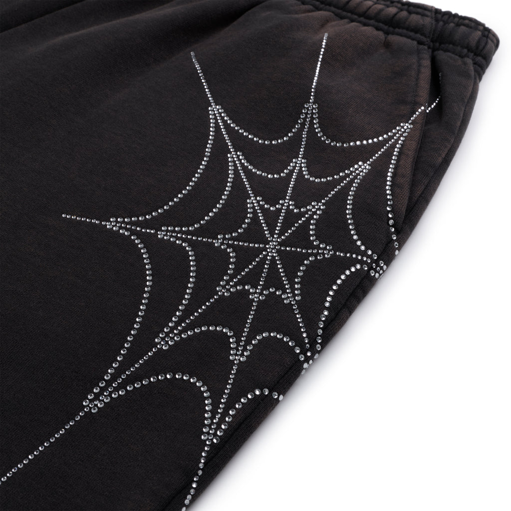 Dark brown cotton fleece sweatpant with a sparkling rhinestone spider web design.