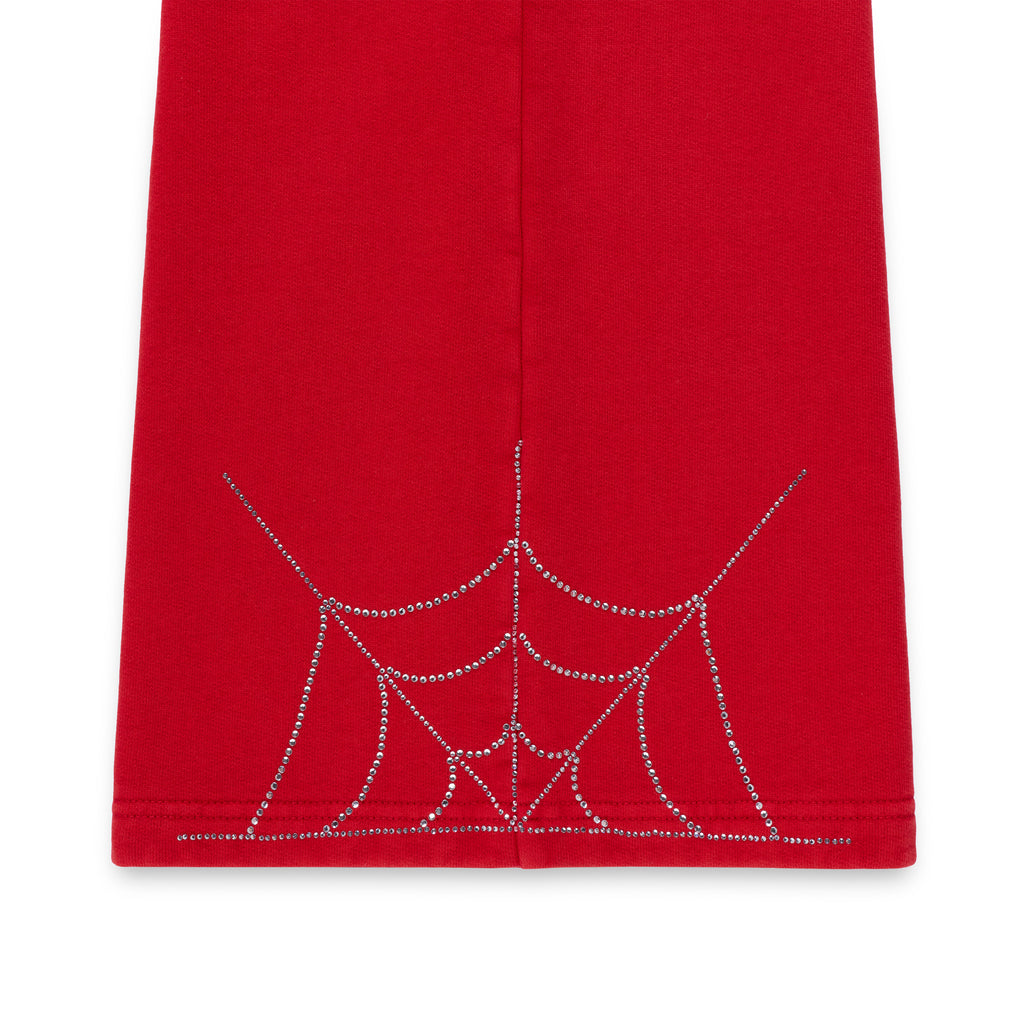 Red cotton fleece sweatpant with sparkling rhinestone spider web detail on the wide leg.