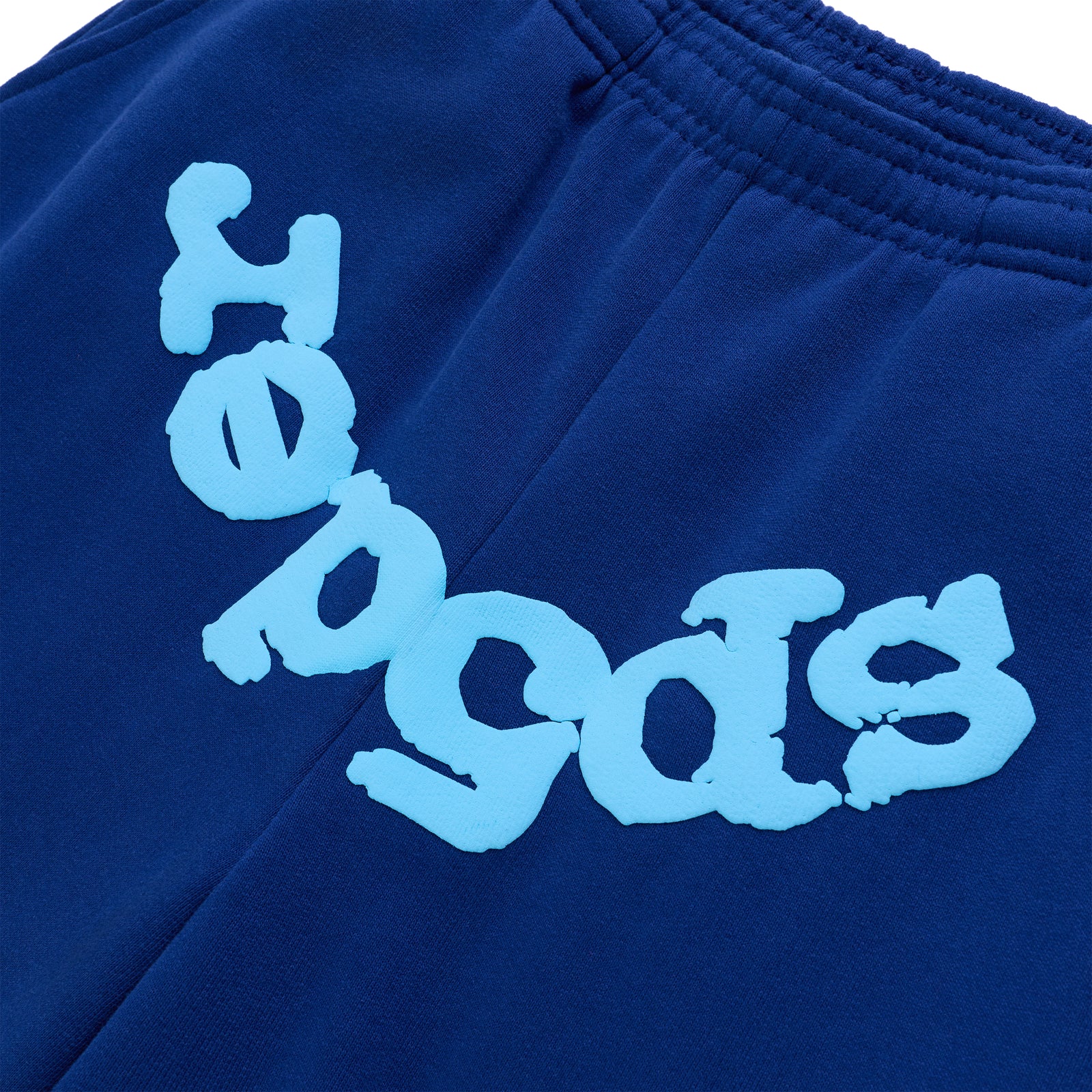 Navy BELUGA V2 SWEATPANT with light blue puff print "SP5DER" text.