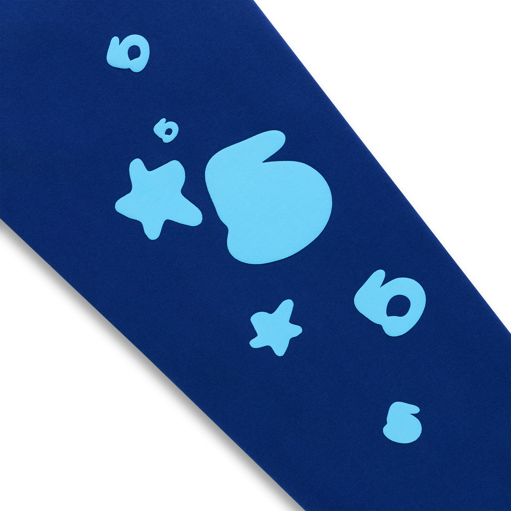 Navy BELUGA V2 SWEATPANT with light blue puff print stars and "5" design.