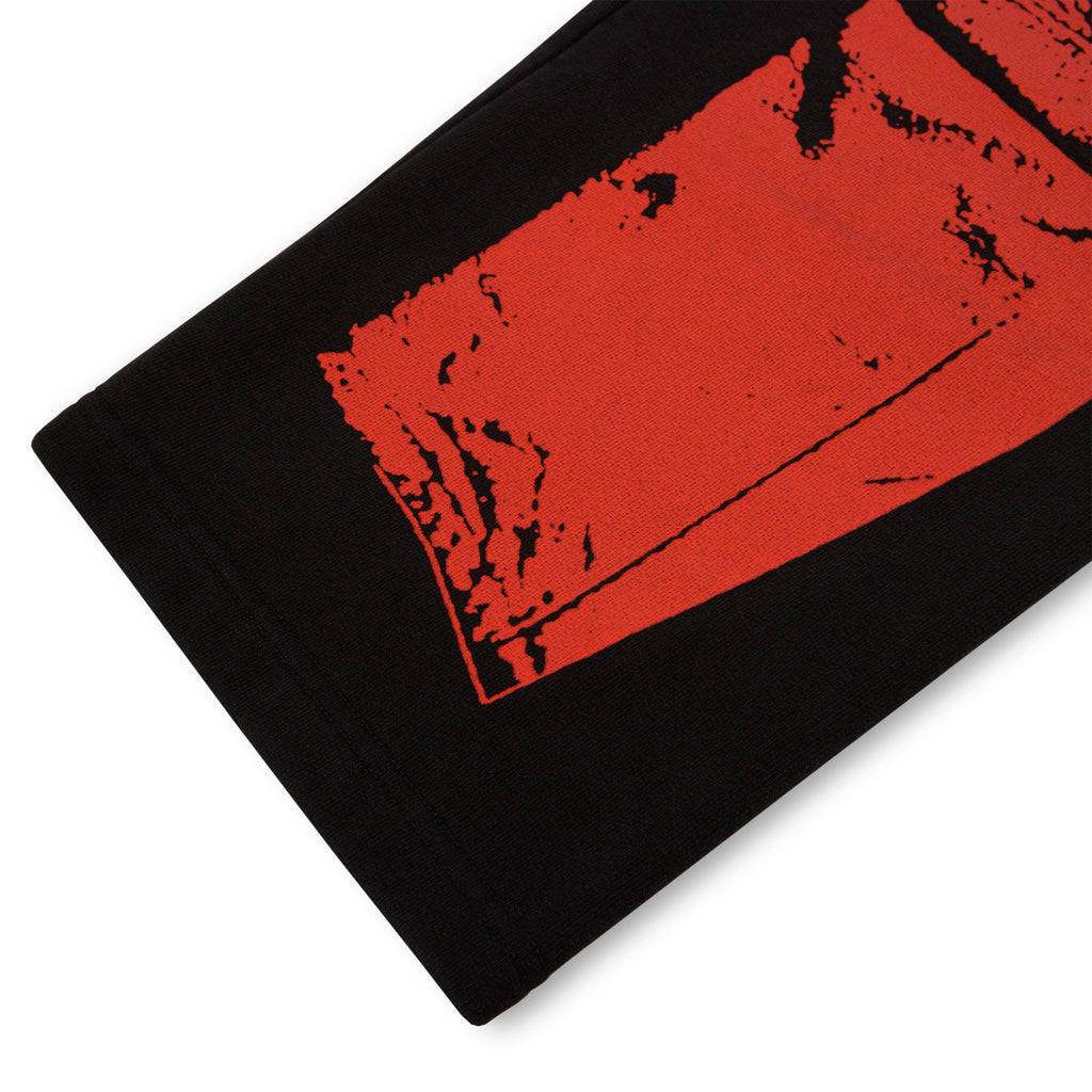 Black JP5 Moto Sweatpant with red painted design, 13oz cotton fleece.