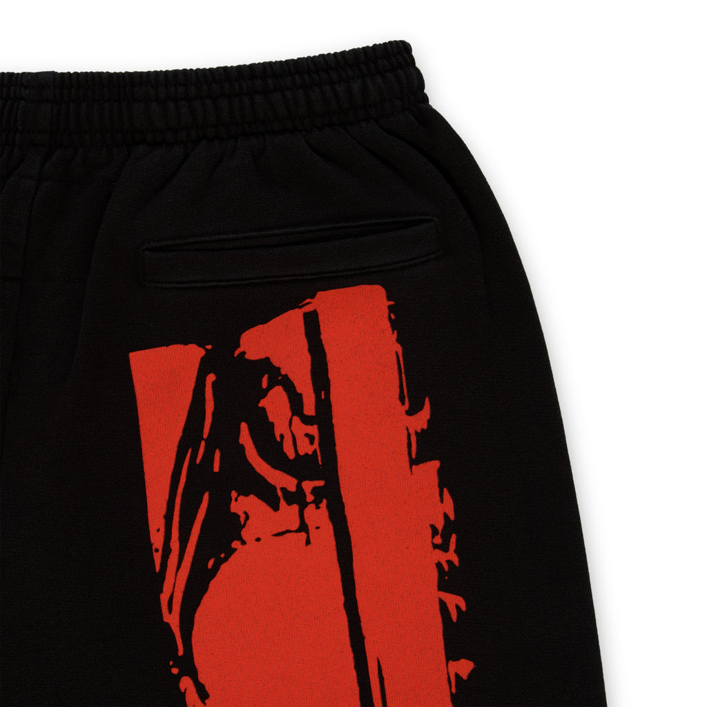 Black JP5 Moto Sweatpant with red painted design, elastic waistband, and back pocket.