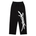 Black cotton fleece sweatpants with rhinestone SP5DER logo and sprayed-effect side stripe.