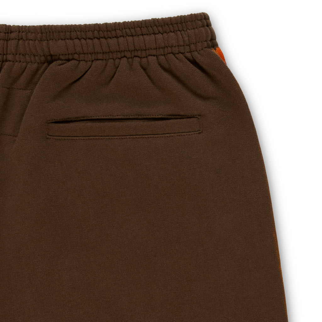 Brown cotton fleece sweatpant with elasticized waistband and orange sprayed-effect side stripe.