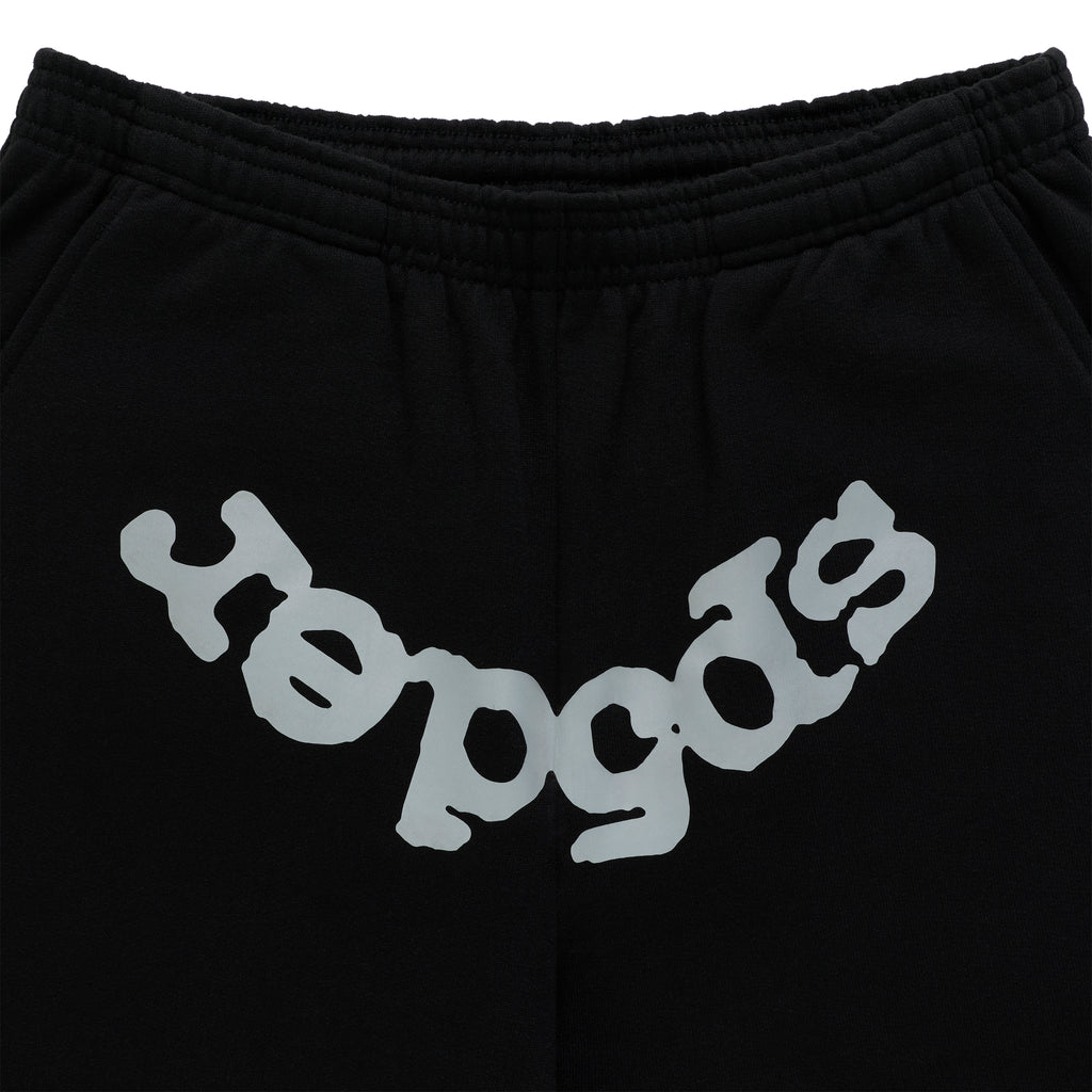 Black cotton fleece sweatpant with reflective "SP5DER" text at the crotch and elasticized waistband.