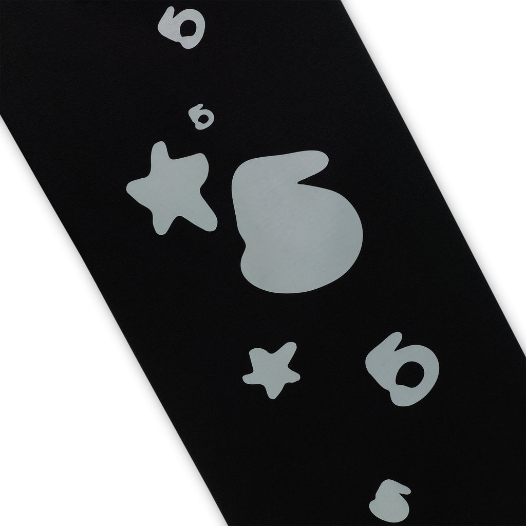 Black 13oz cotton fleece sweatpant with reflective 3M print, '5' and star designs.