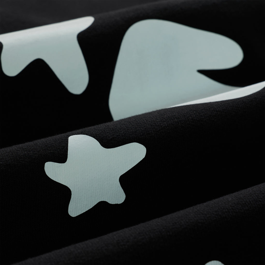 Black cotton fleece sweatpants with reflective 3M star and '5' designs.