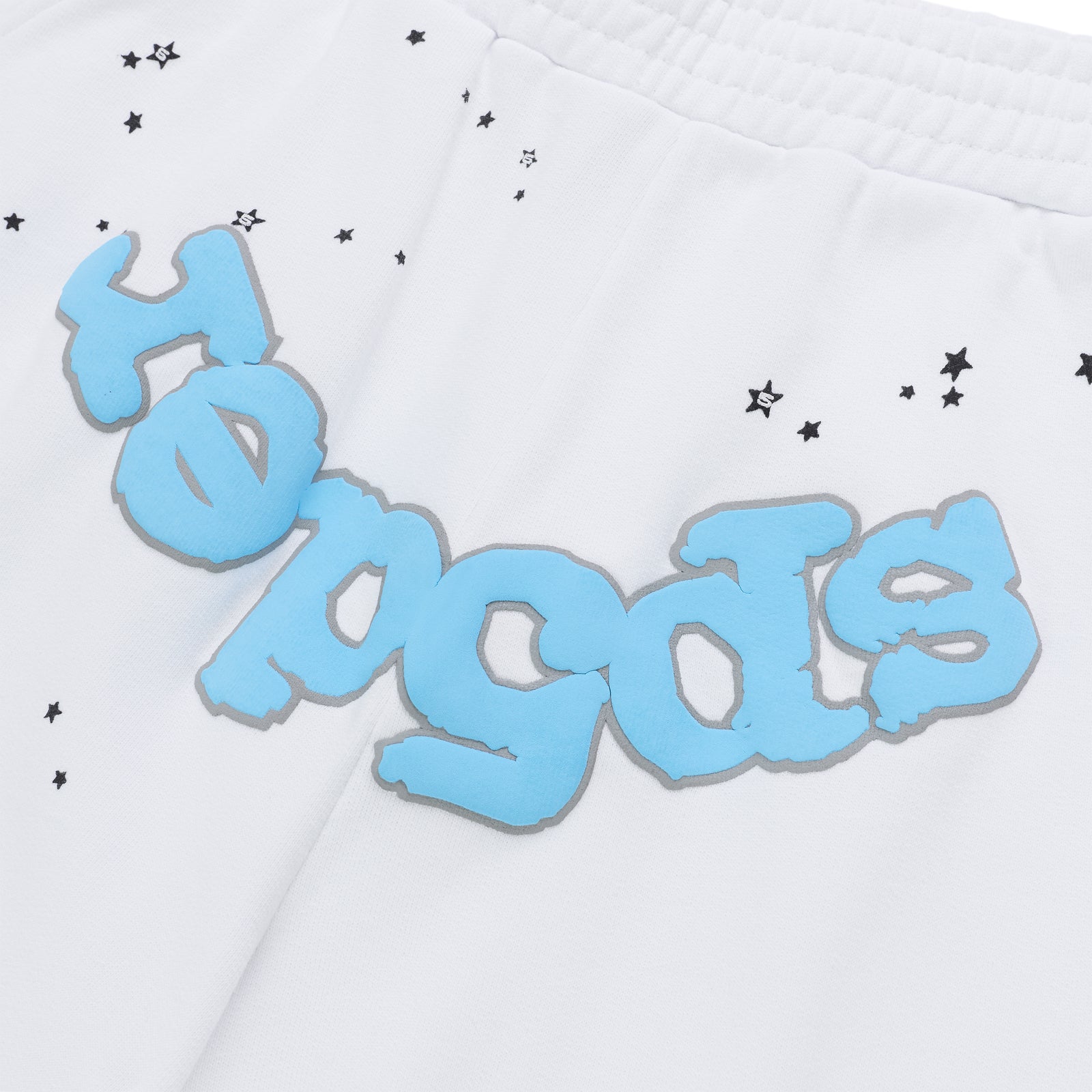 White cotton fleece sweatshorts with blue "SP5DER" text print and black star pattern.