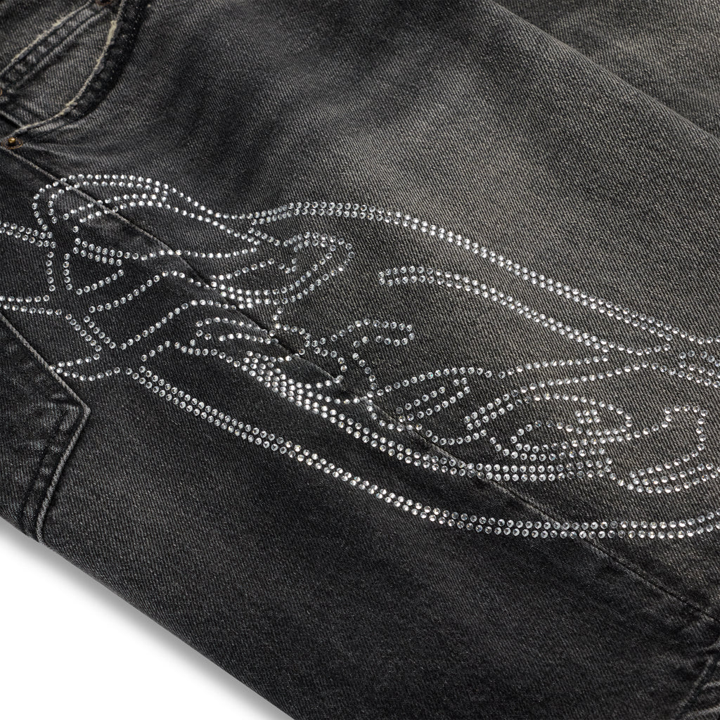 Vintage wash black denim shorts with a large rhinestone web and text design.