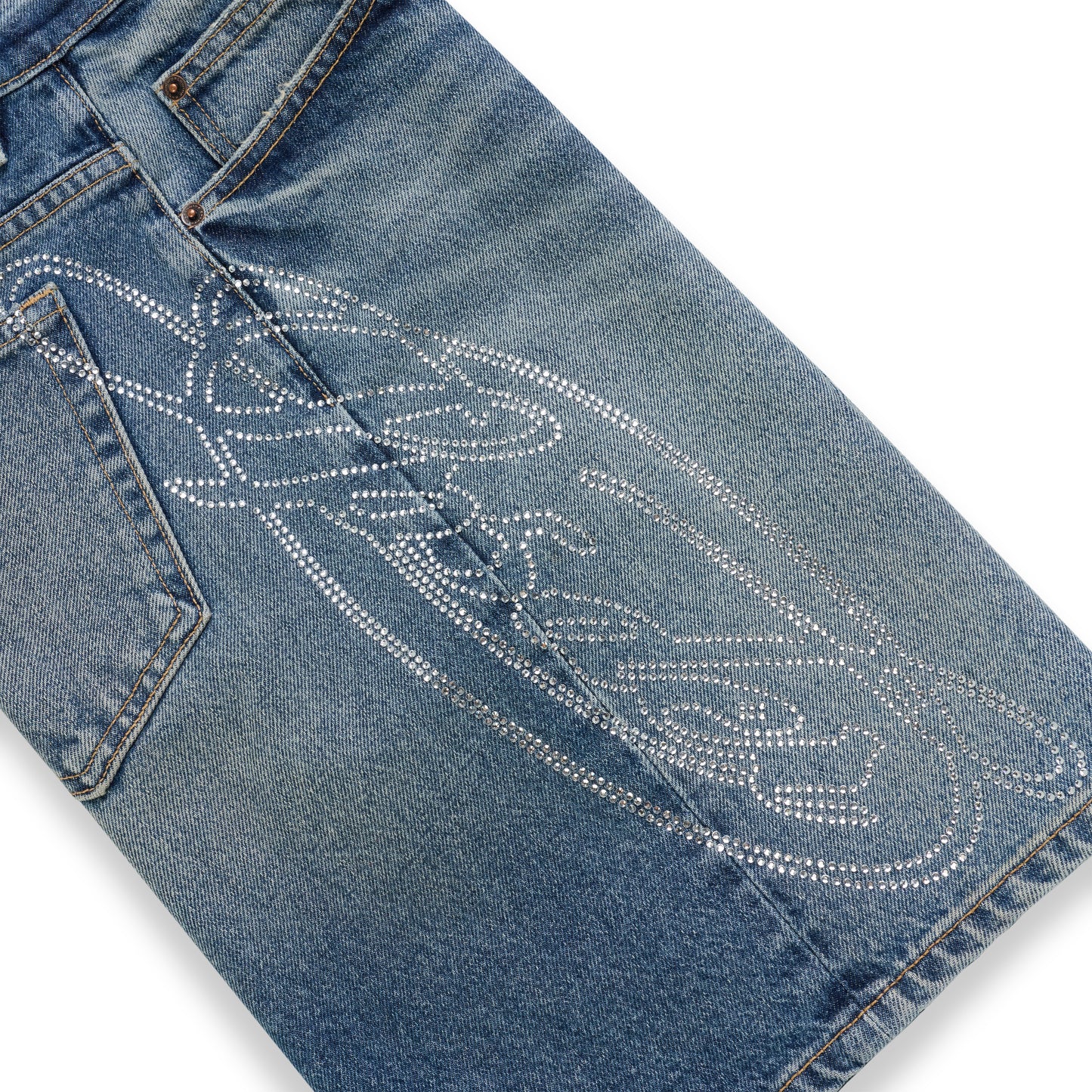 Blue denim short with a large, intricate rhinestone web design on the back.