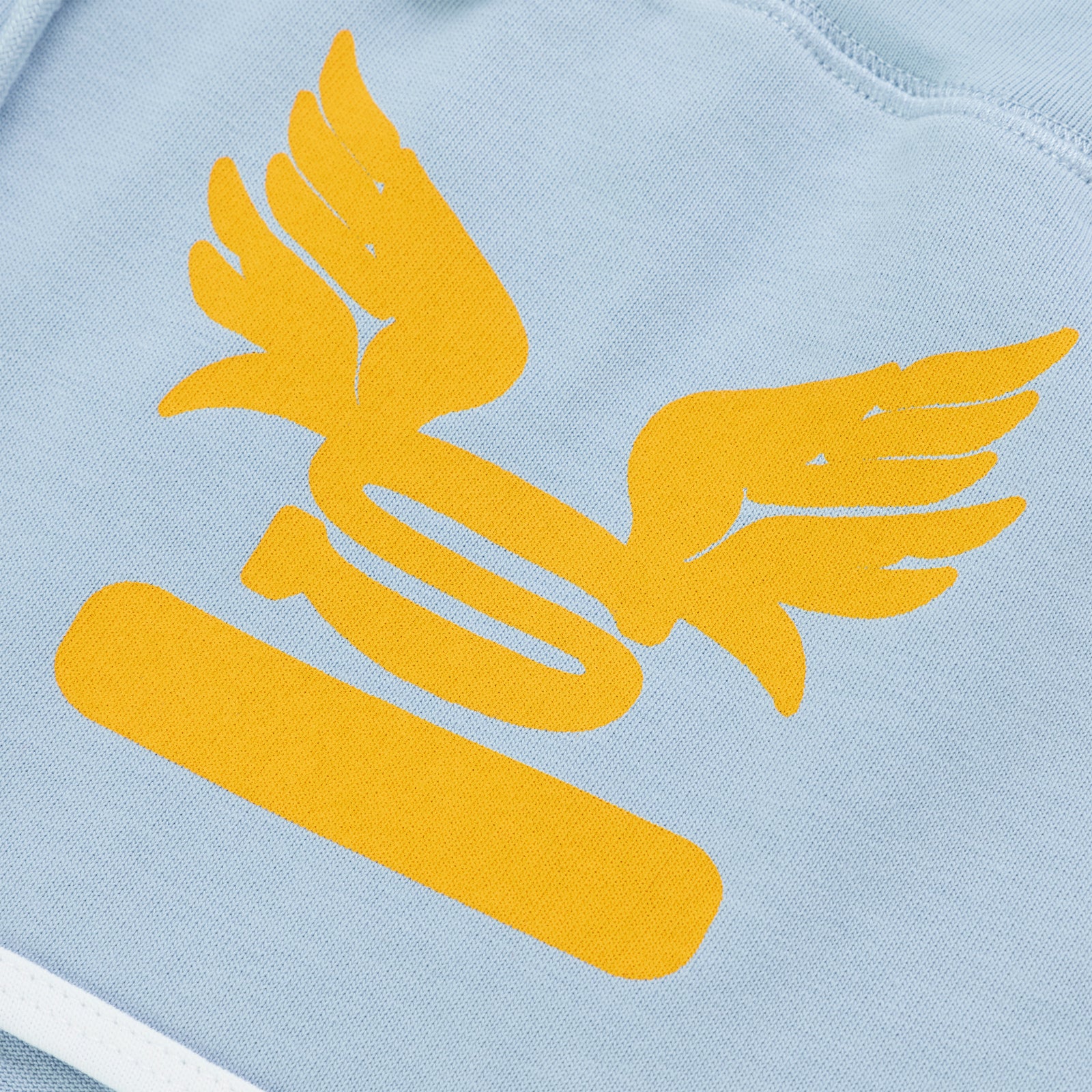 Light blue SP5 WIDE BOXER with a large yellow winged logo and bar graphic.