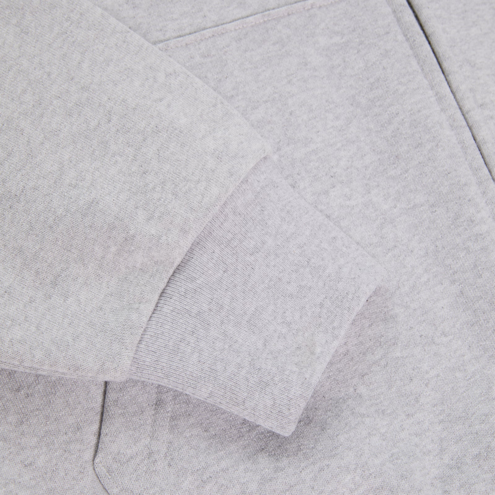 Light grey 13oz cotton fleece MX555 zip hoodie with ribbed cuffs and waistband.