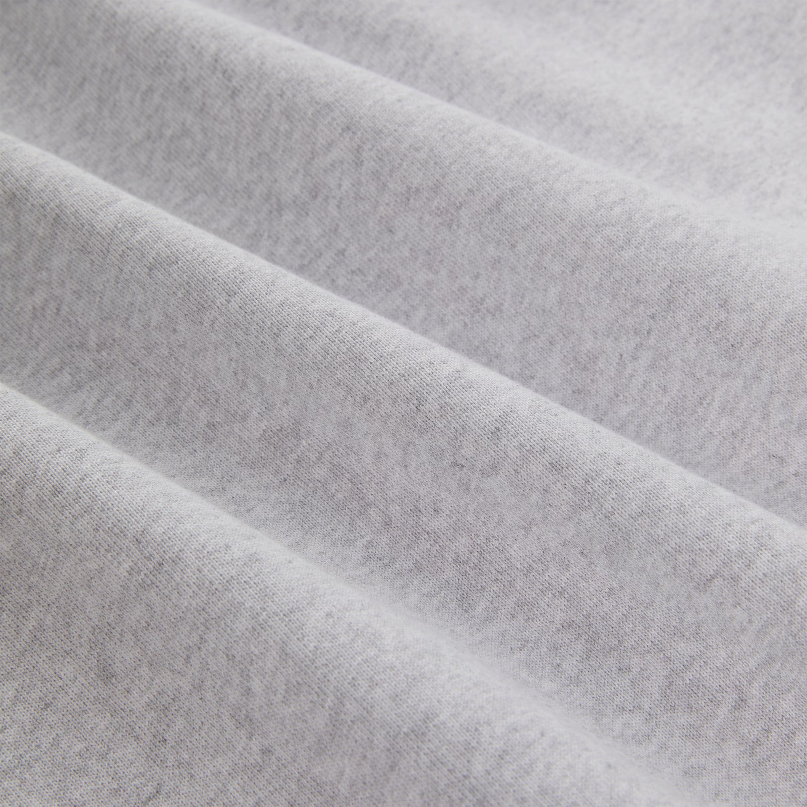 Light grey 100% cotton fleece MX555 ZIP HOODIE fabric with subtle folds.