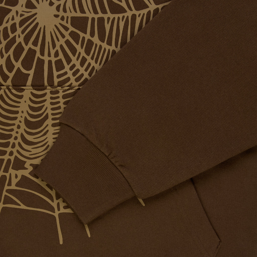 Brown cotton fleece hoodie with tan rhinestone spider web and text detail.