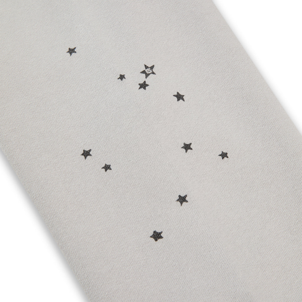 Light grey 100% cotton fleece hoodie with scattered black star prints.